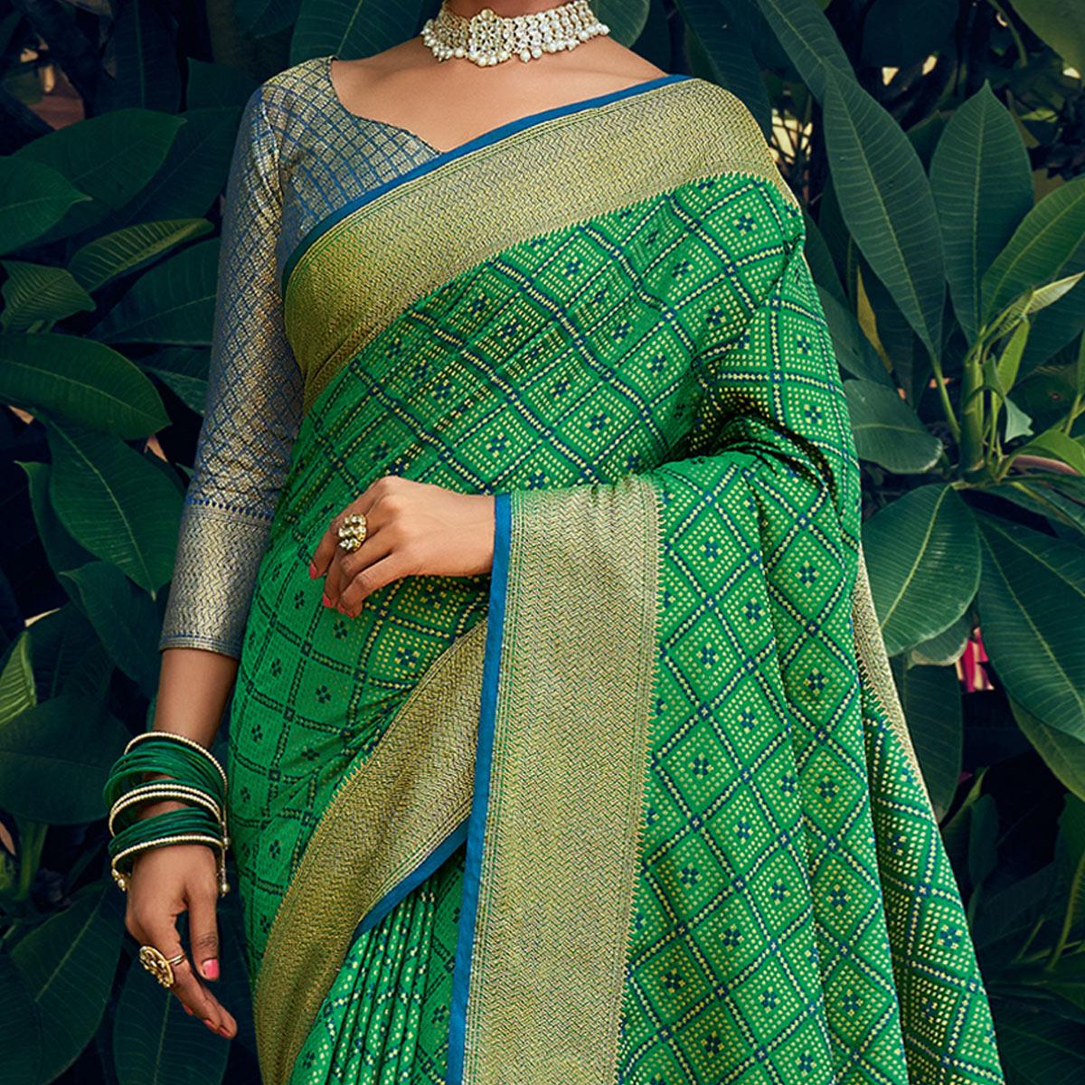 green-festive-wear-woven-patola-silk-saree-118407