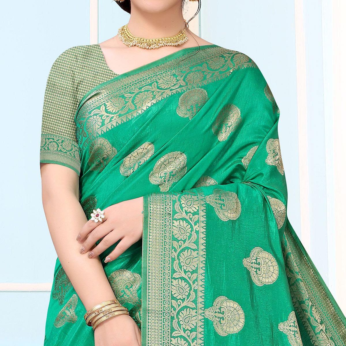 green-festive-wear-woven-raw-silk-saree-141957