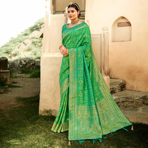 green-festive-wear-woven-silk-saree-135395