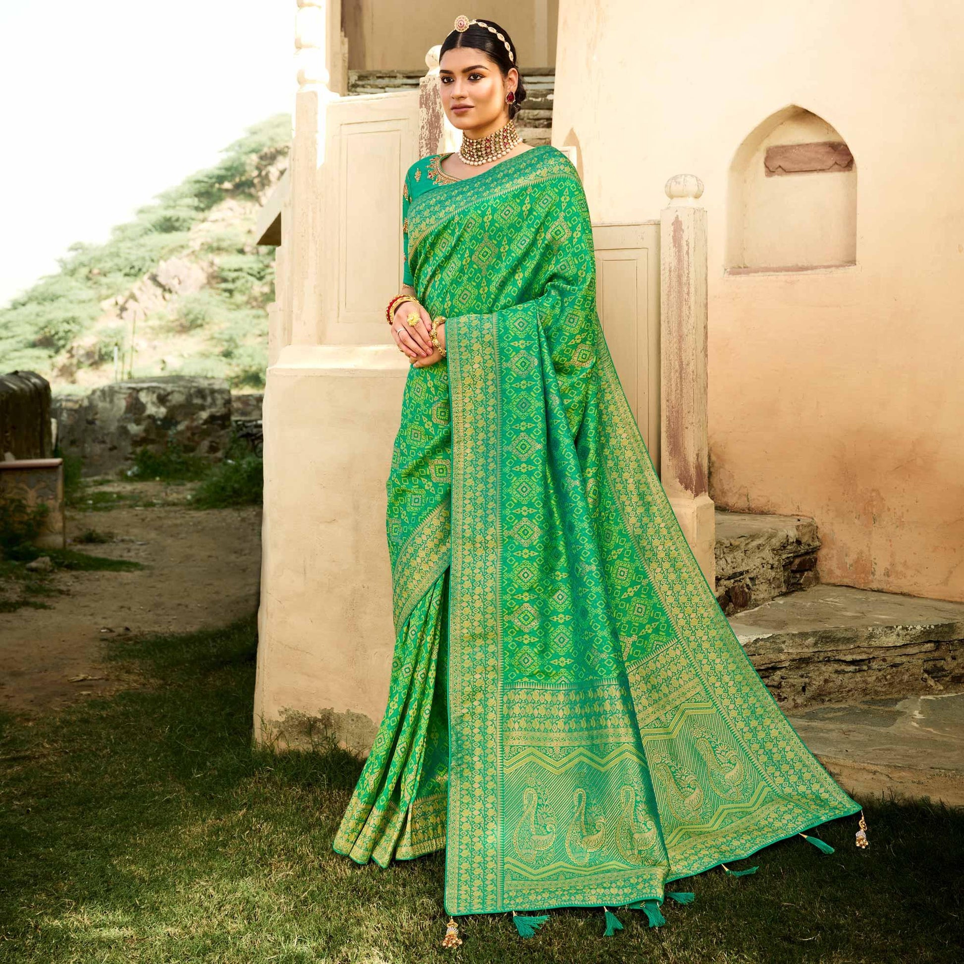 green-festive-wear-woven-silk-saree-135395