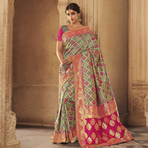 green-festive-wear-woven-silk-saree-138905