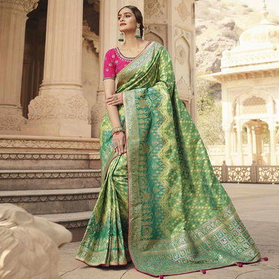 green-festive-wear-woven-silk-saree-138904