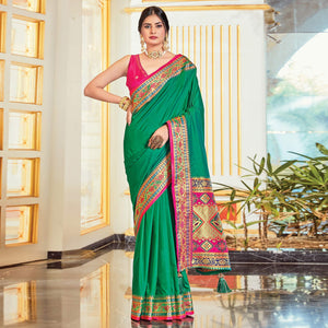 green-festive-wear-woven-silk-saree-127634