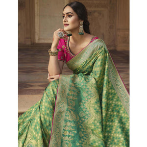 green-festive-wear-woven-silk-saree-138904