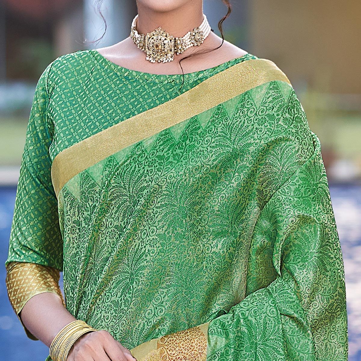 green-festive-wear-woven-organza-saree-132591