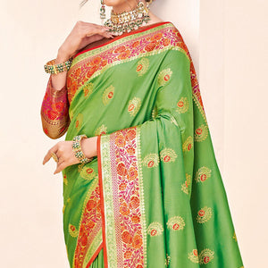 green-festive-wear-woven-silk-saree-139806