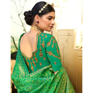 green-festive-wear-woven-silk-saree-135395
