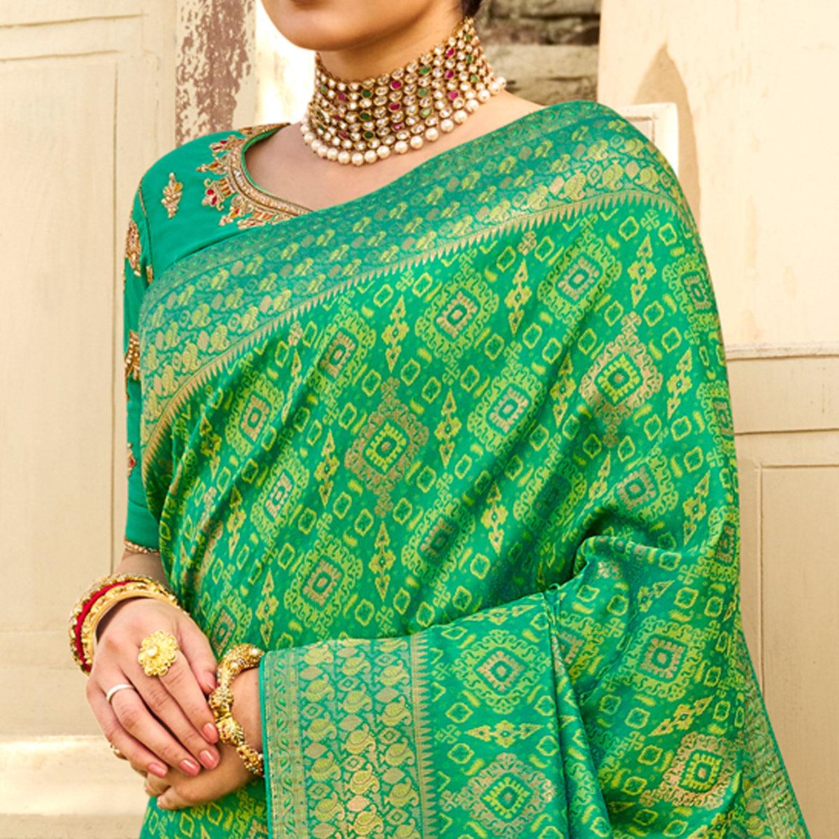 green-festive-wear-woven-silk-saree-135395