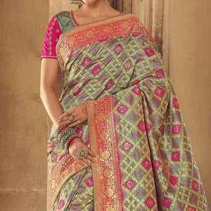 green-festive-wear-woven-silk-saree-138905