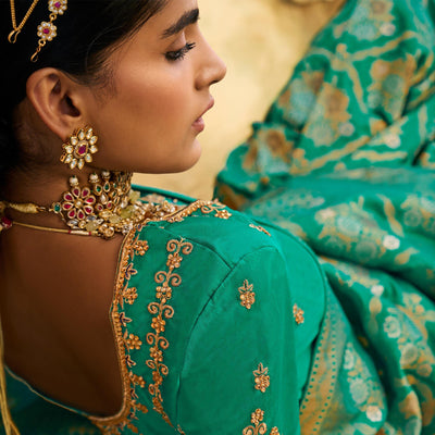 green-festive-wear-woven-silk-saree-135401