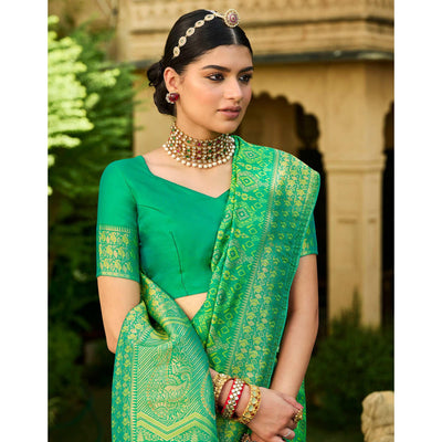 green-festive-wear-woven-silk-saree-135395