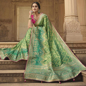 green-festive-wear-woven-silk-saree-138904