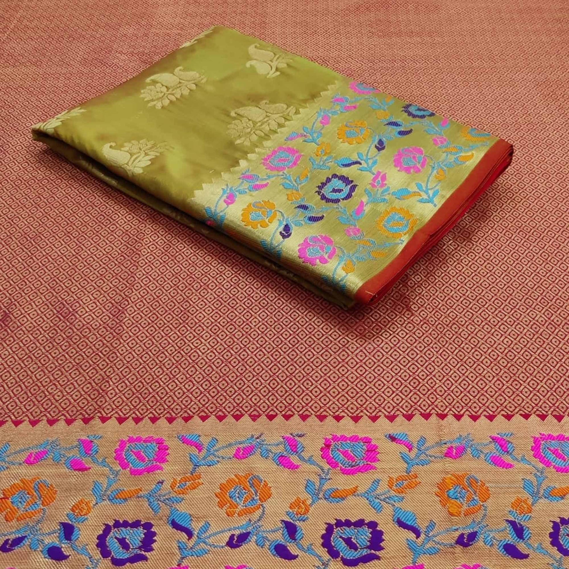 green-festive-wear-woven-silk-saree-with-border-111632