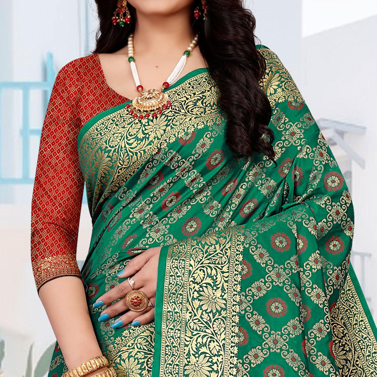 green-festive-wear-woven-silk-saree-with-patola-rich-pallu-140207