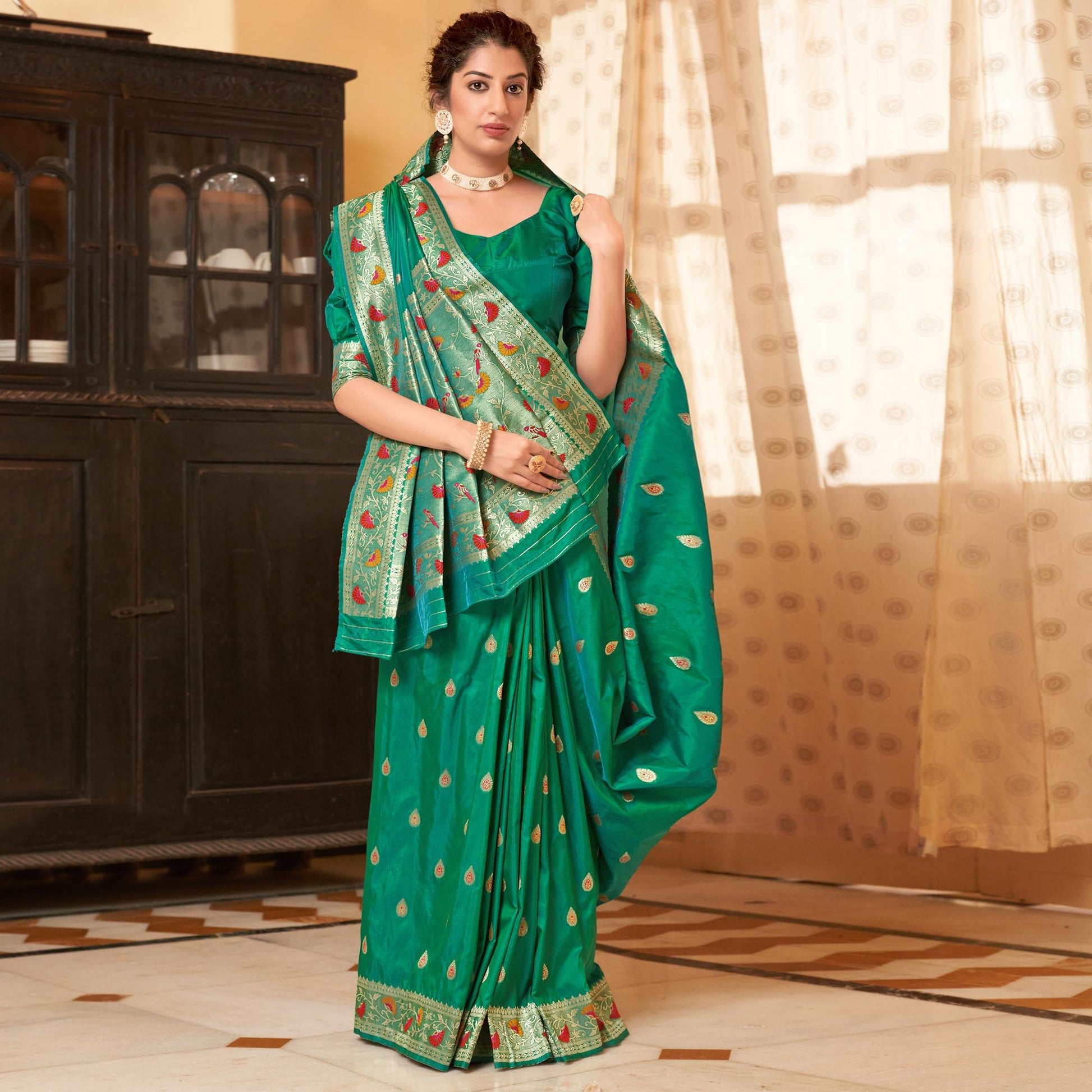 green-festive-wear-woven-soft-banarasi-silk-saree-131150