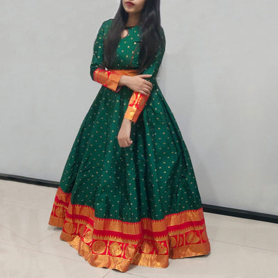graceful-green-colored-festive-wear-woven-tapetta-silk-gown-80850
