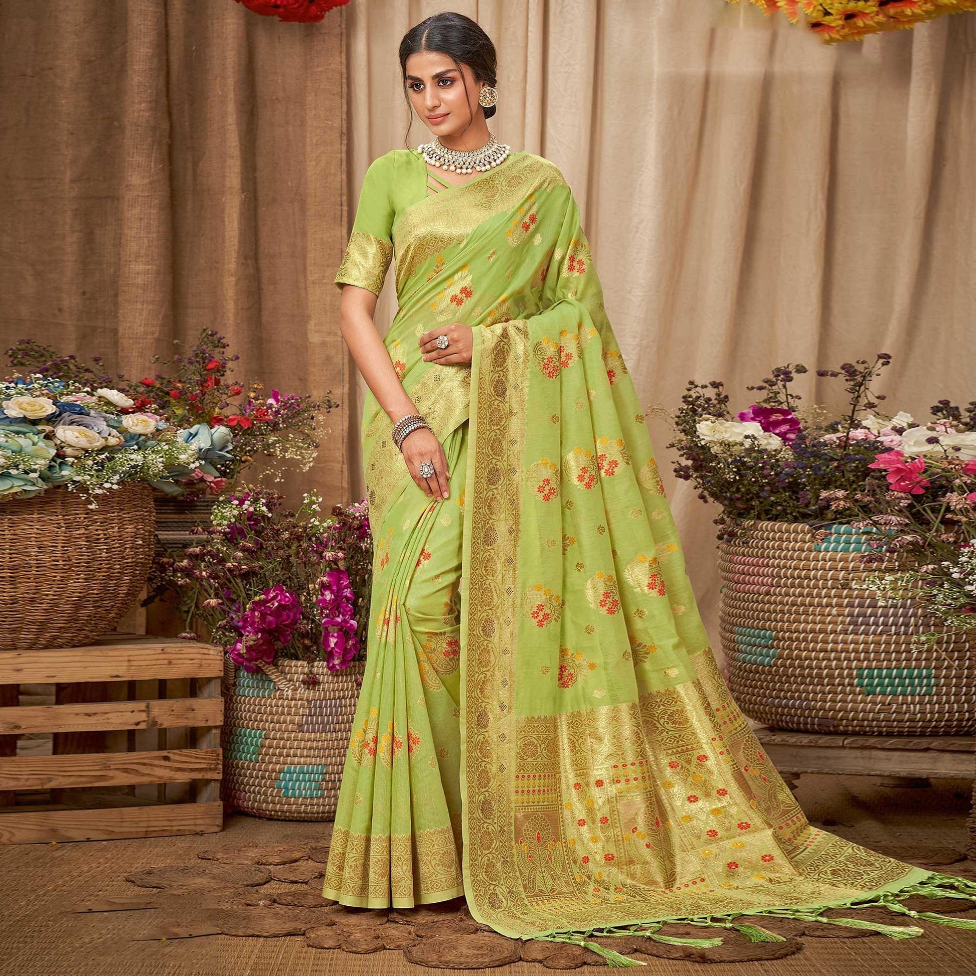 green-festive-wear-woven-with-embellished-cotton-saree-with-tassels-142608