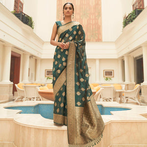 green-festive-wear-zari-woven-organza-silk-saree-with-tassels-137612