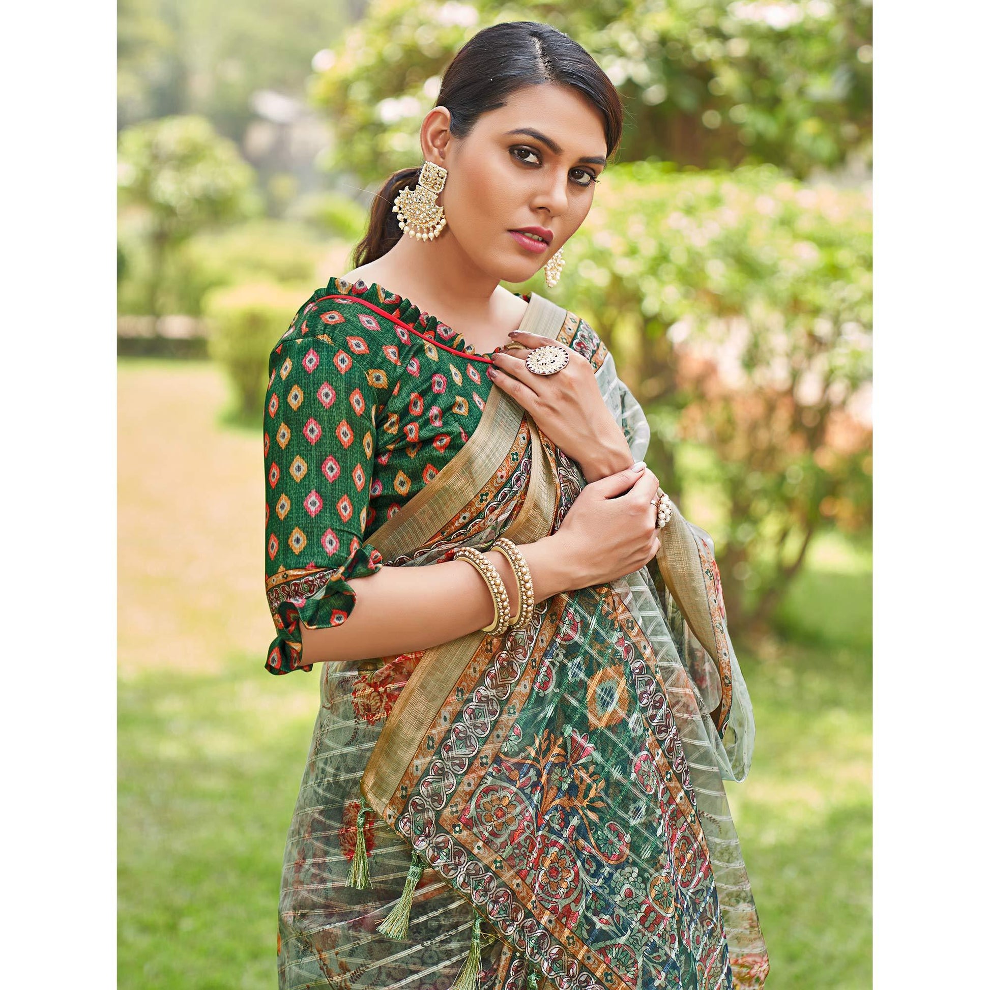green-floral-digital-printed-with-sequence-linen-saree-1