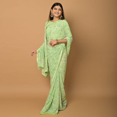 green-floral-printed-georgette-saree-145573