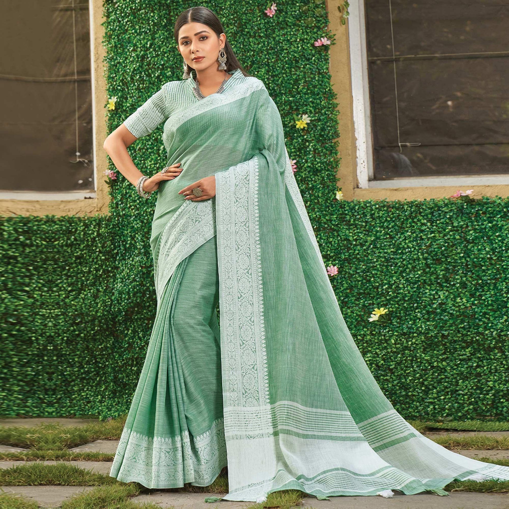 green-floral-woven-linen-saree-144136