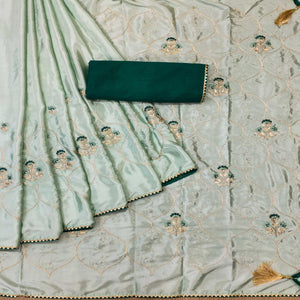 green-floral-zari-embroidered-pure-silk-saree-145135