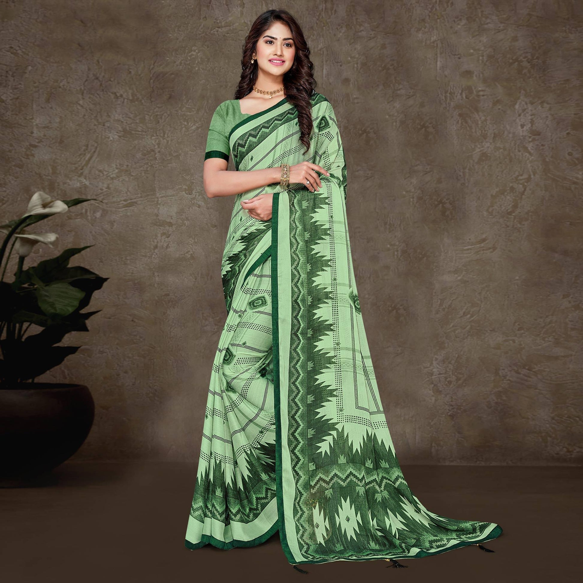 green-geometric-printed-chiffon-saree-with-tassels
