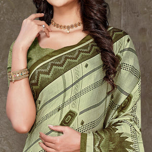 green-geometric-printed-chiffon-saree-with-tassels-1