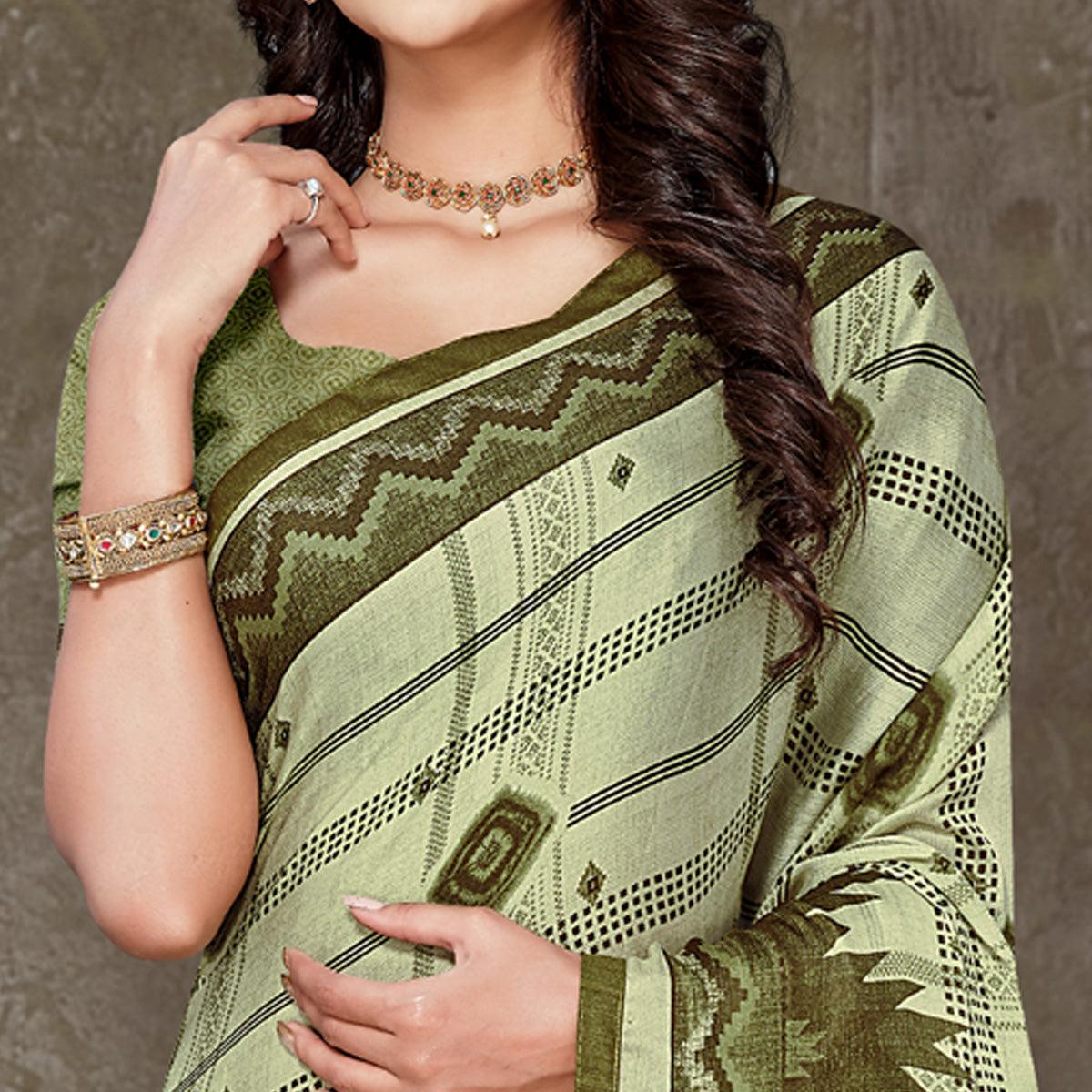 green-geometric-printed-chiffon-saree-with-tassels-1