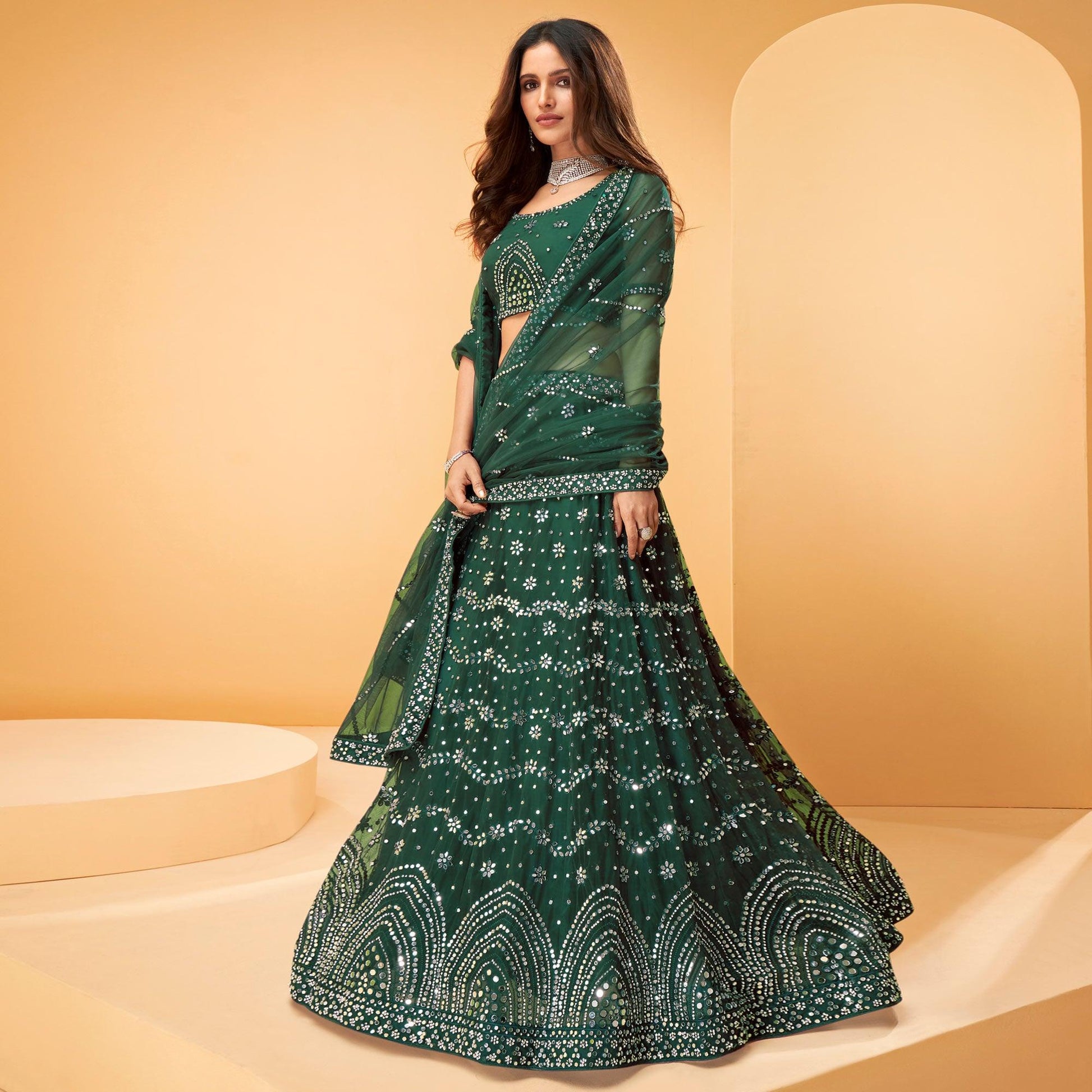 green-wedding-wear-embroidered-embellished-netted-lehenga-choli-138510