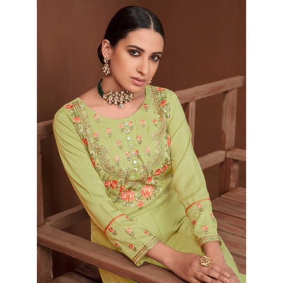 green-party-wear-embroidered-muslin-cotton-silk-gown-138122