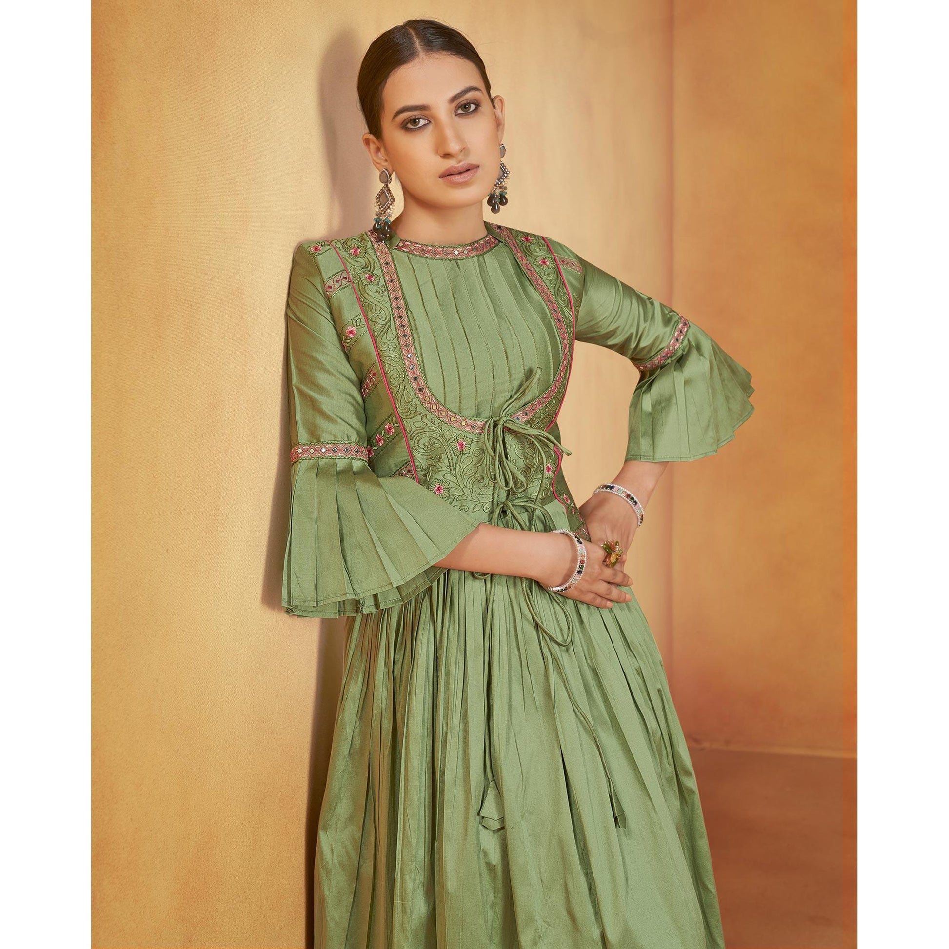 green-party-wear-embroidered-tapetta-gown-139891