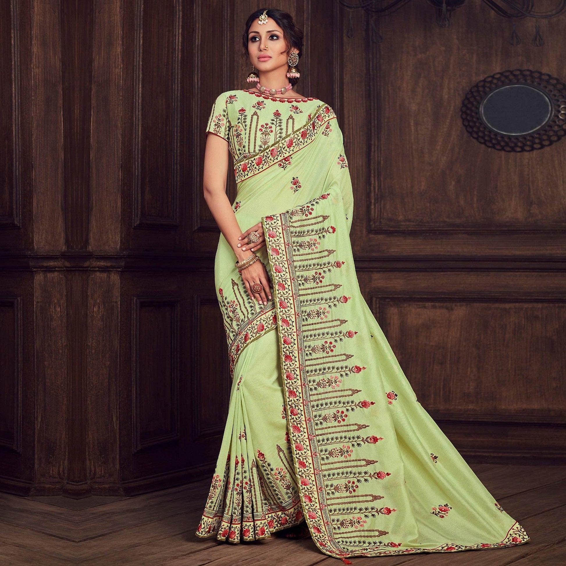 green-party-wear-heavy-embroidered-silk-saree-141326
