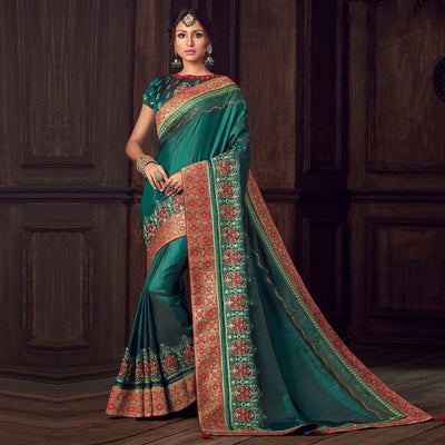 green-party-wear-heavy-embroidered-silk-saree-141328