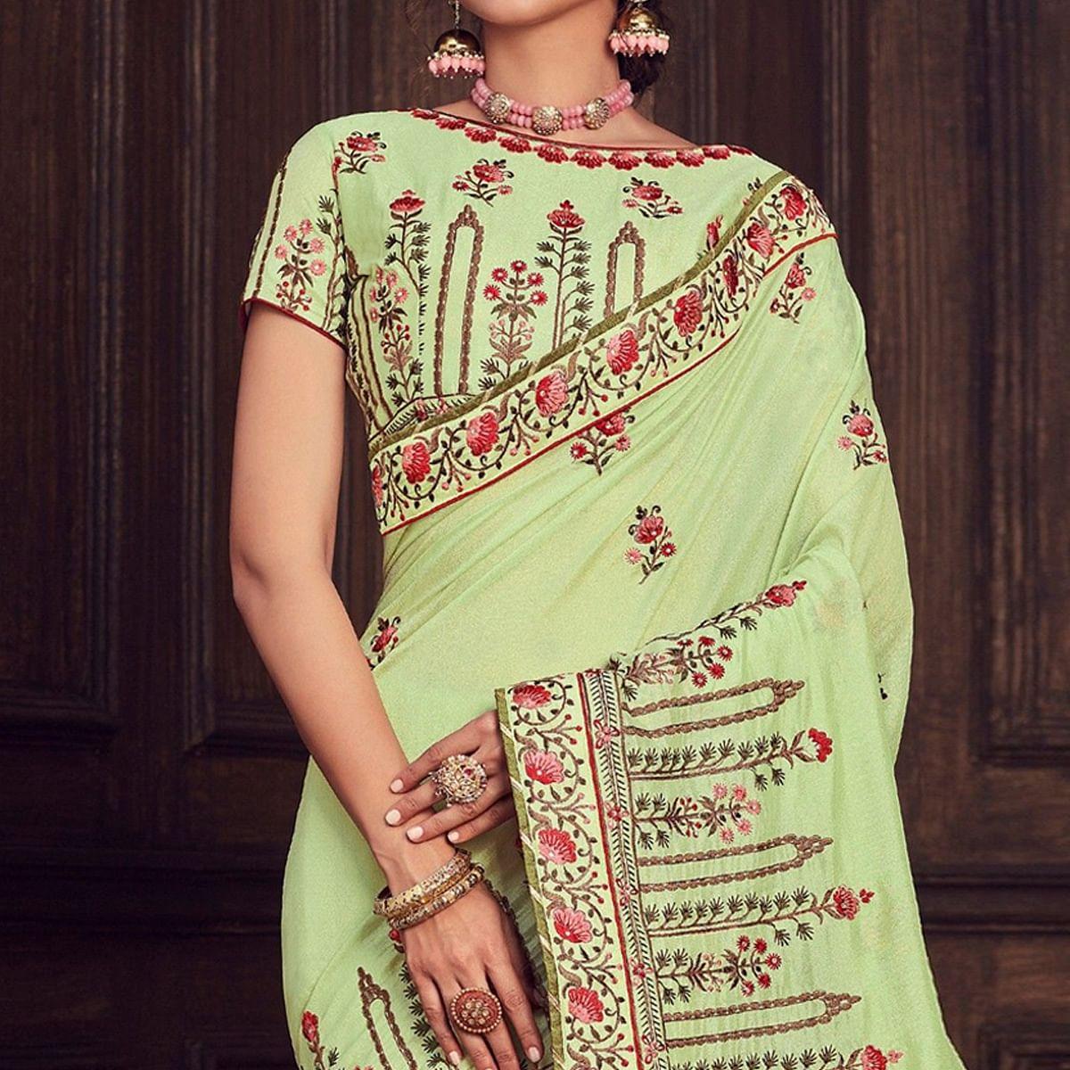 green-party-wear-heavy-embroidered-silk-saree-141326