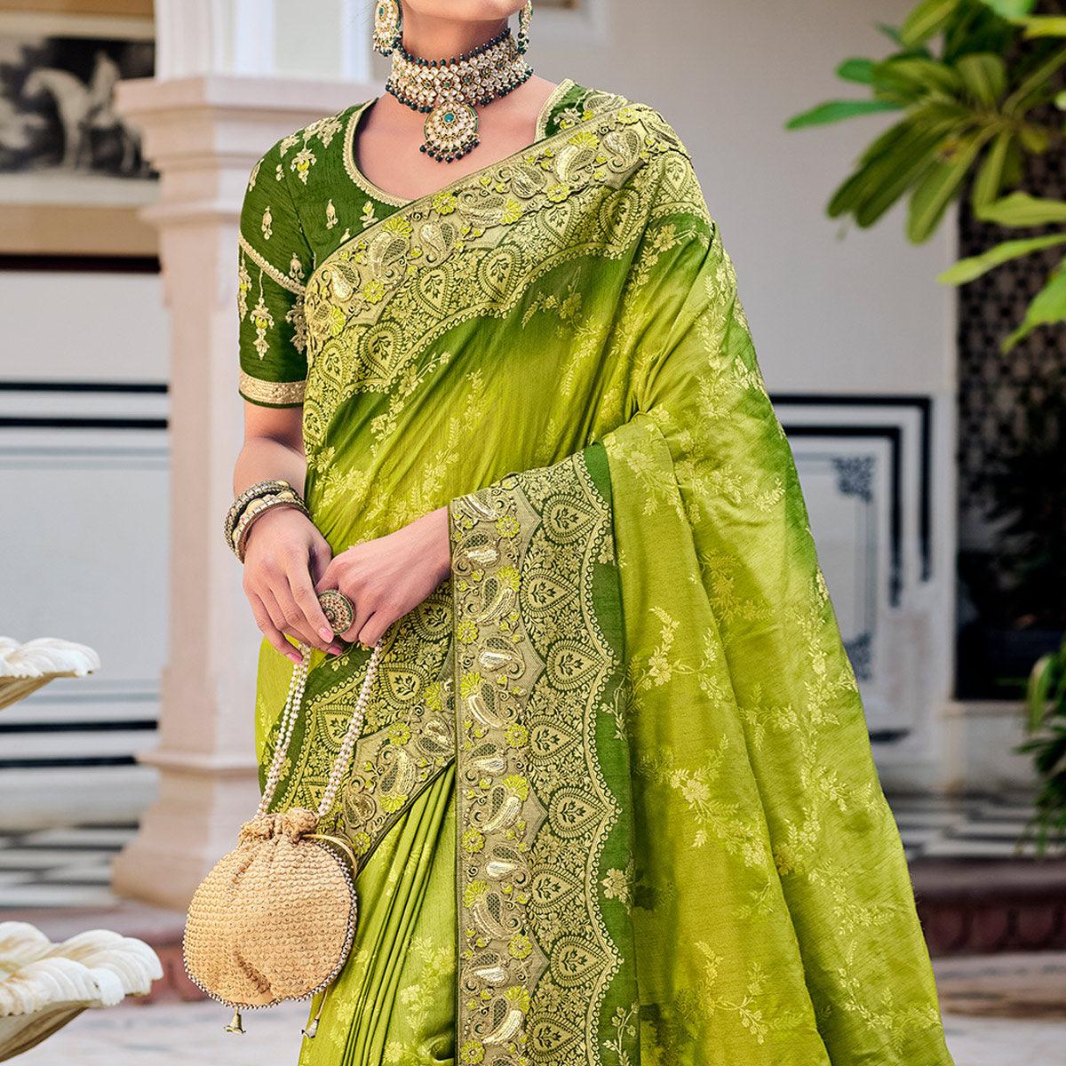 green-party-wear-woven-embroidered-silk-saree-138300