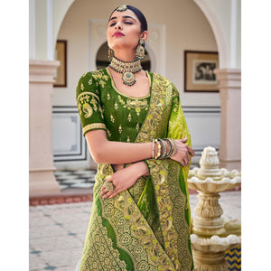 green-party-wear-woven-embroidered-silk-saree-138300