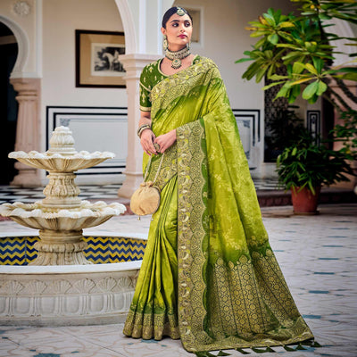 green-party-wear-woven-embroidered-silk-saree-138300