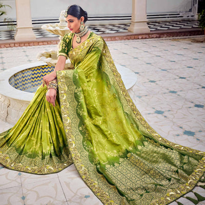 green-party-wear-woven-embroidered-silk-saree-138300
