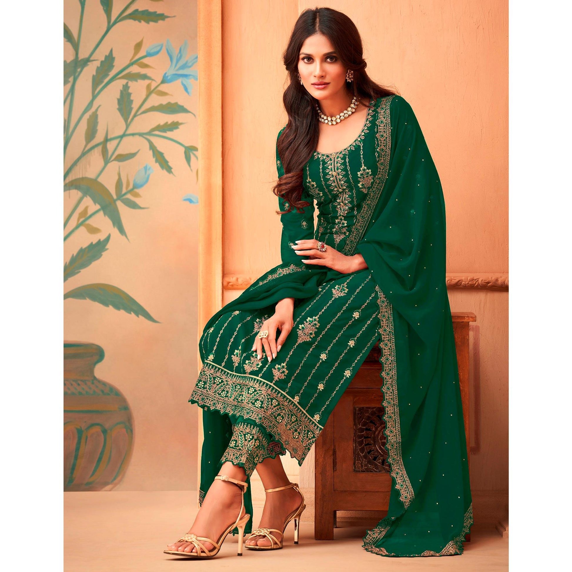 green-partywear-embroidered-sequence-work-faux-georgette-salwar-suit-127879