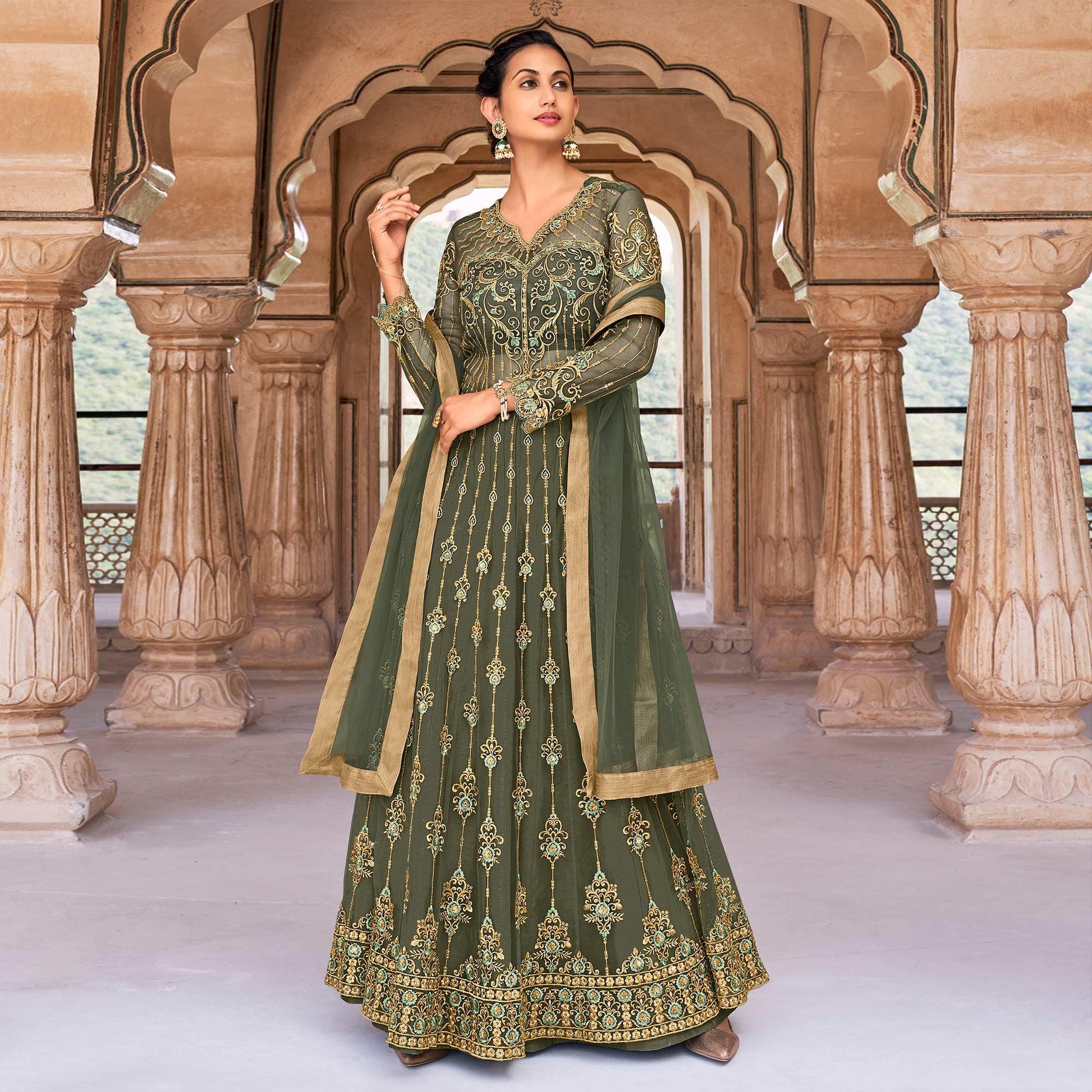 green-partywear-embroidered-swarovski-work-soft-net-gown-137066