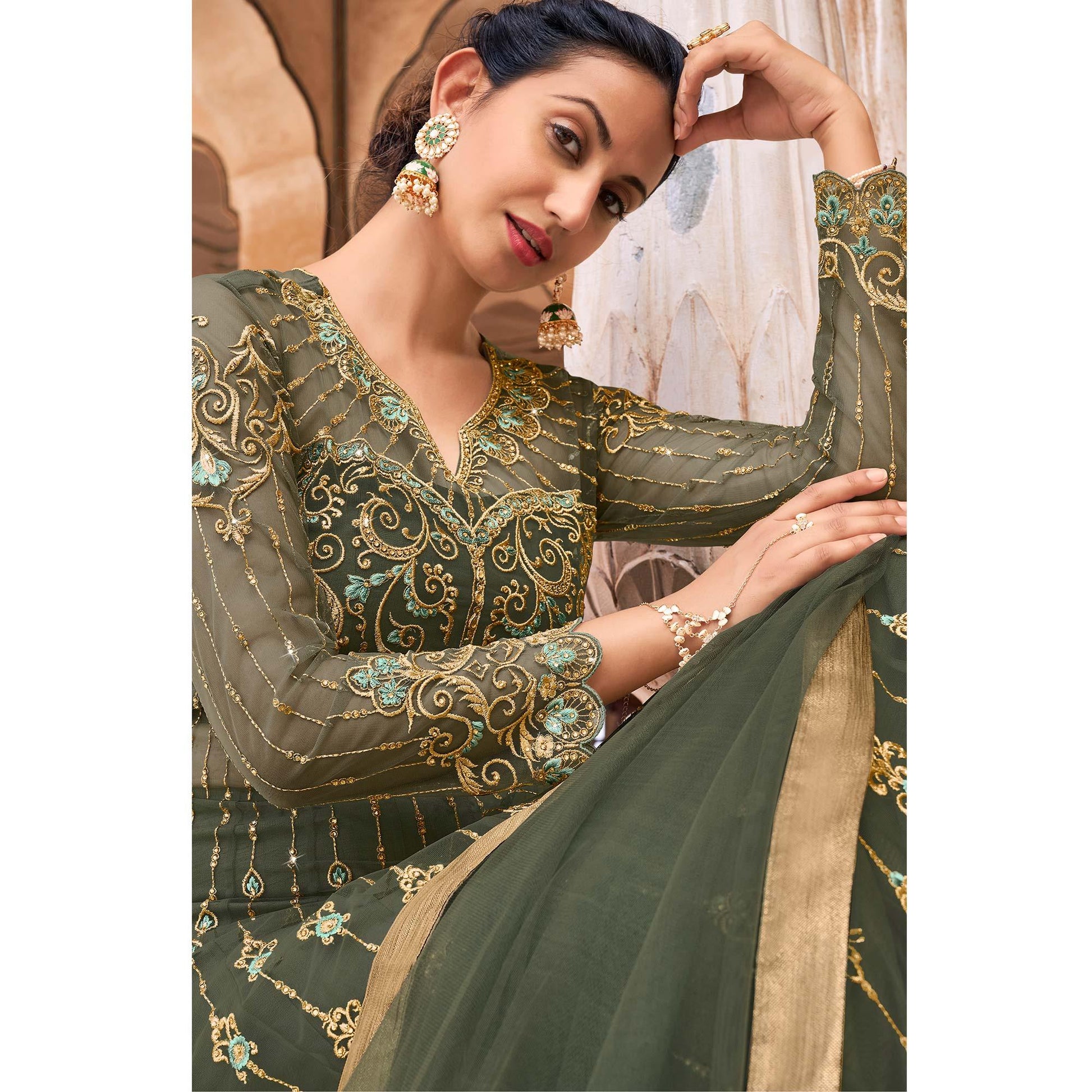 green-partywear-embroidered-swarovski-work-soft-net-gown-137066