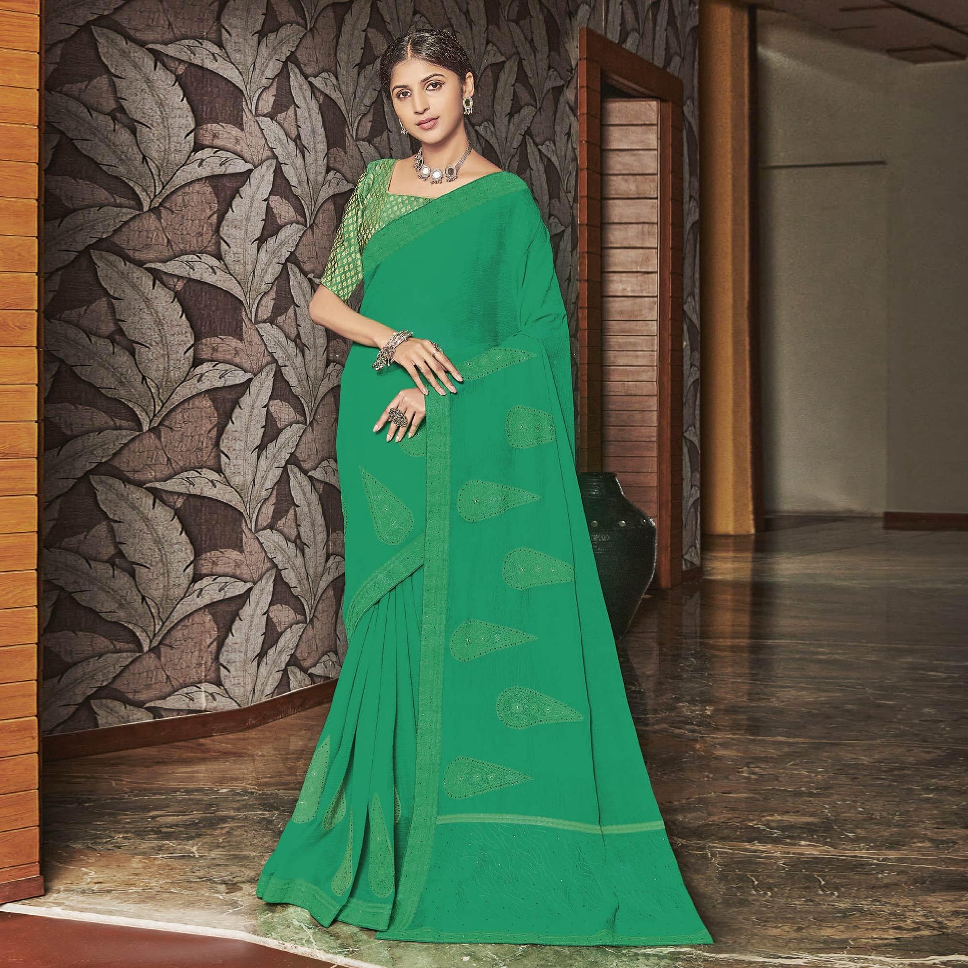 green-partywear-embroidered-chiffon-saree-131334