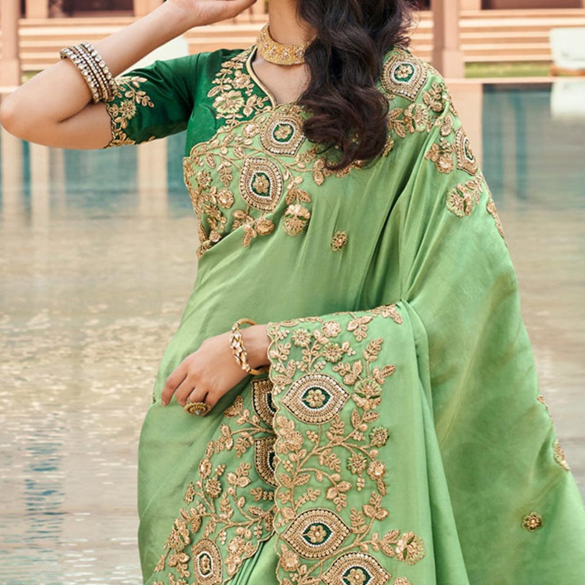green-partywear-embroidered-pure-tissue-saree-121219