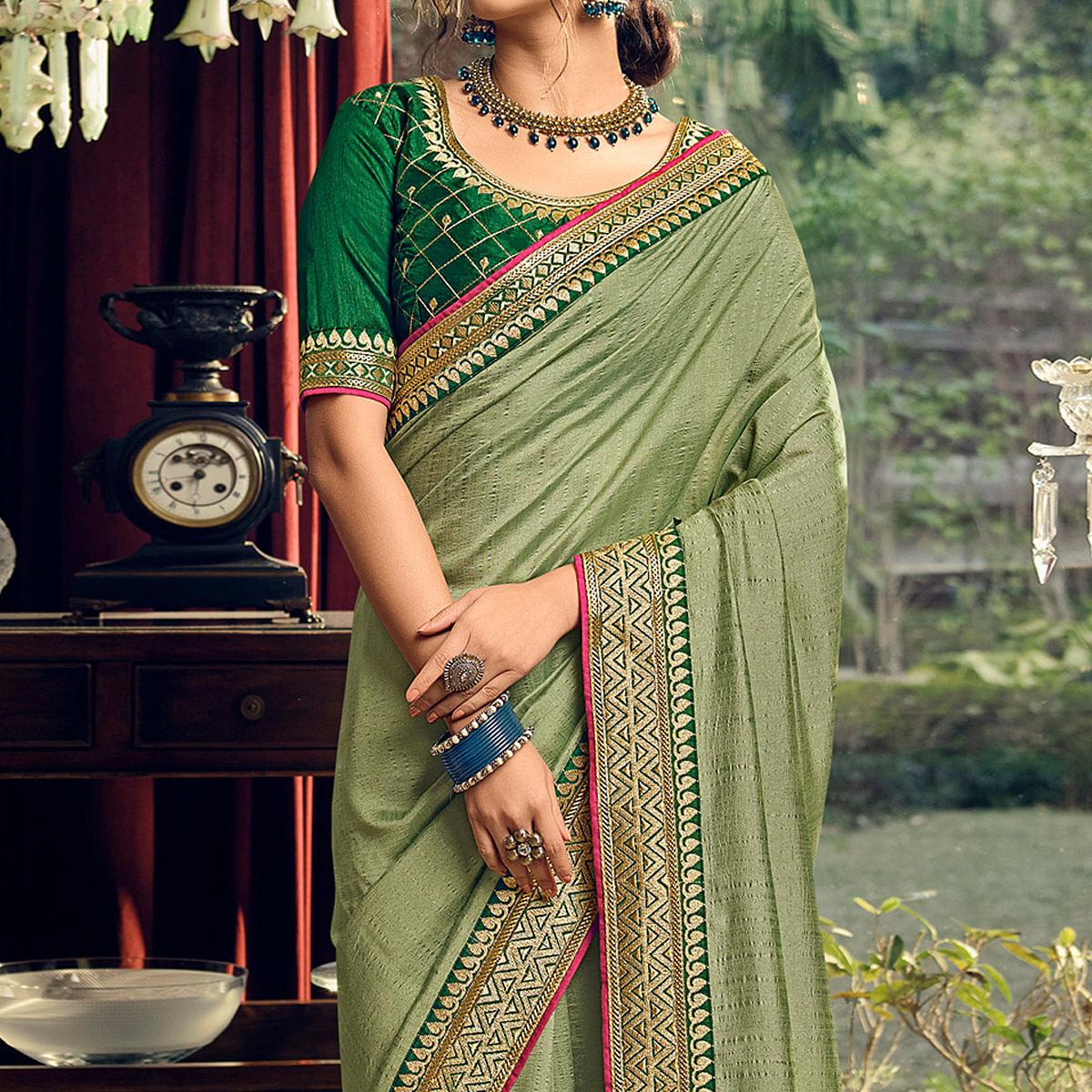 green-partywear-embroidered-vichitra-silk-saree-138147