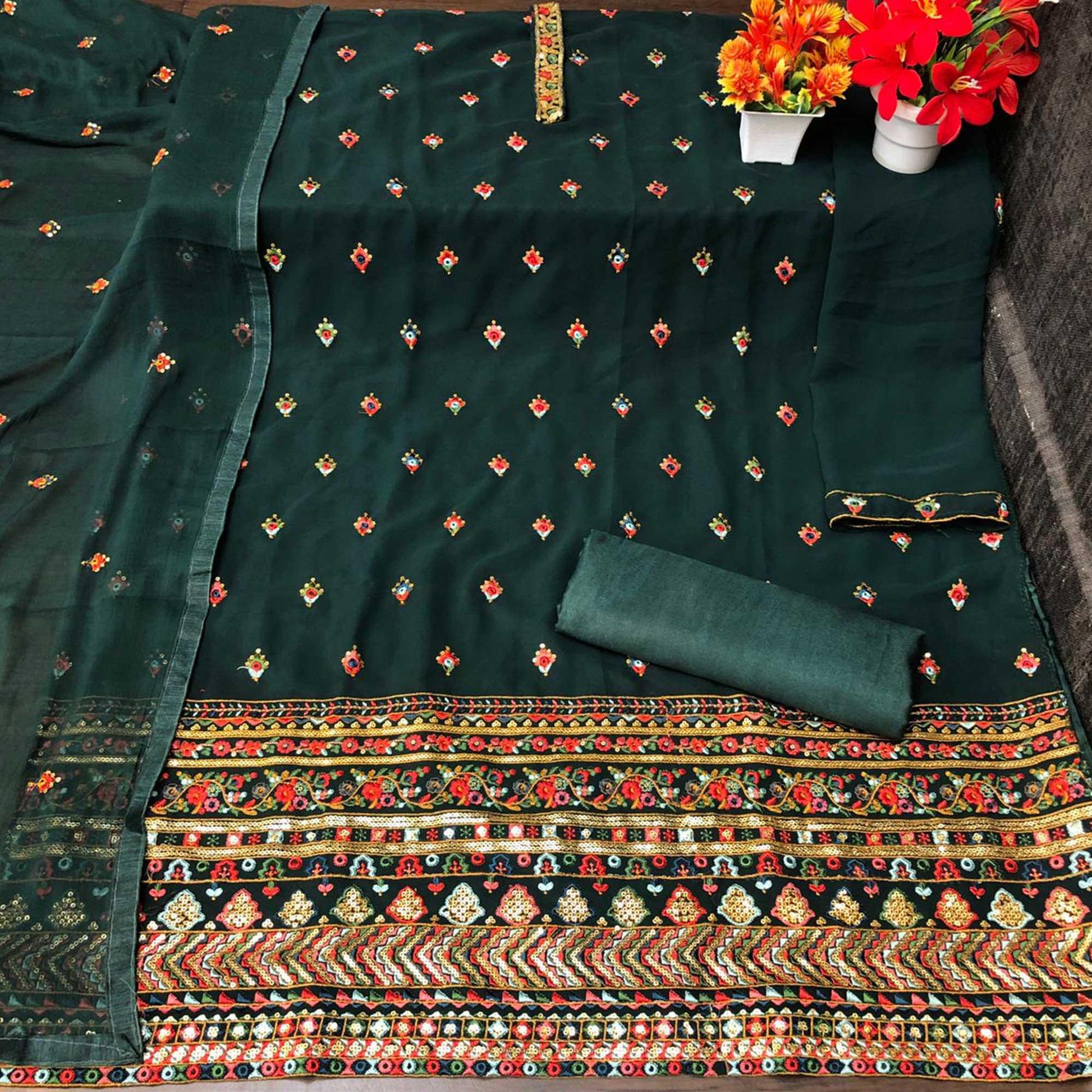 green-partywear-embroidered-with-sequence-work-heavy-faux-georgette-patiala-suit-115245