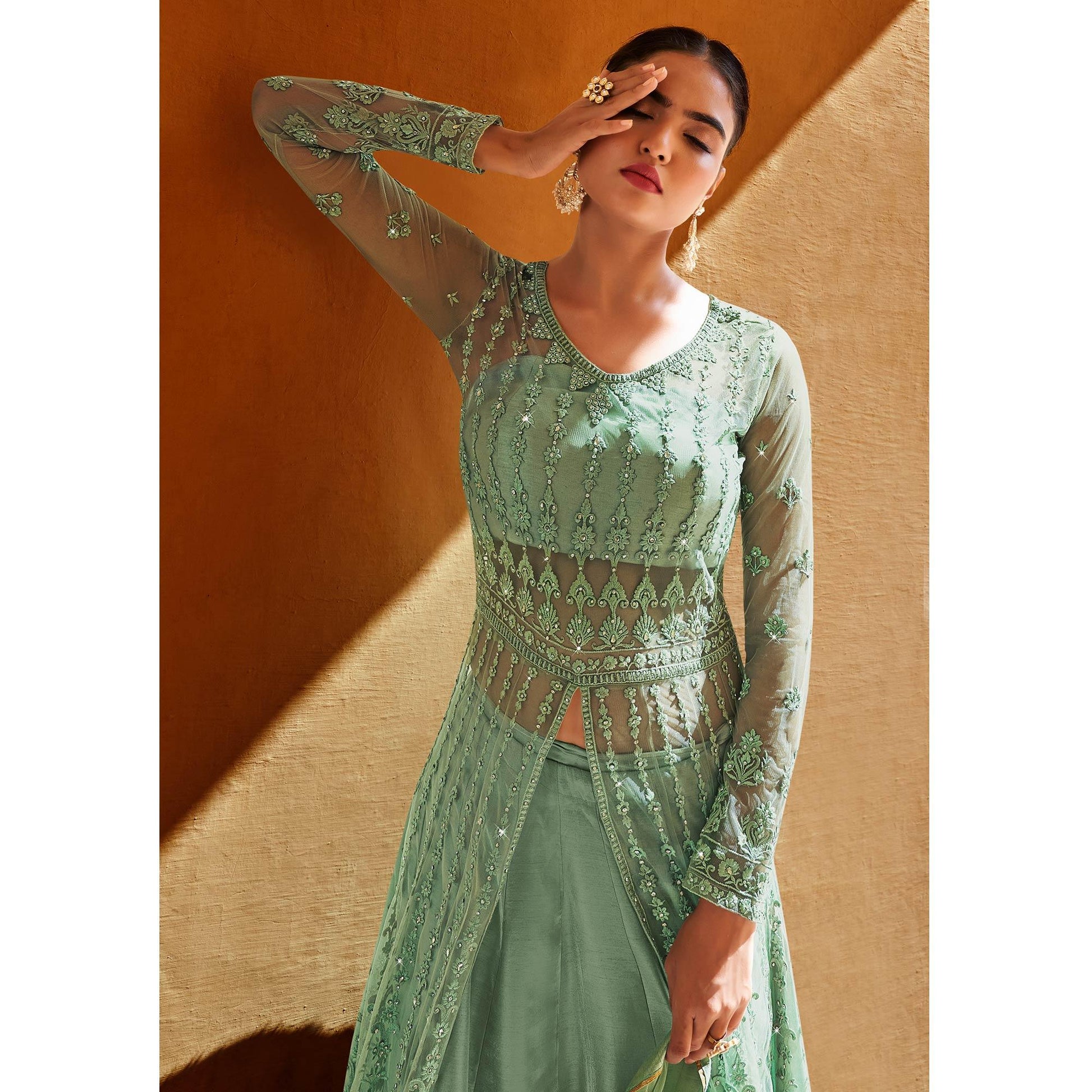 green-partywear-embroidered-with-swarovski-soft-net-suit-128698