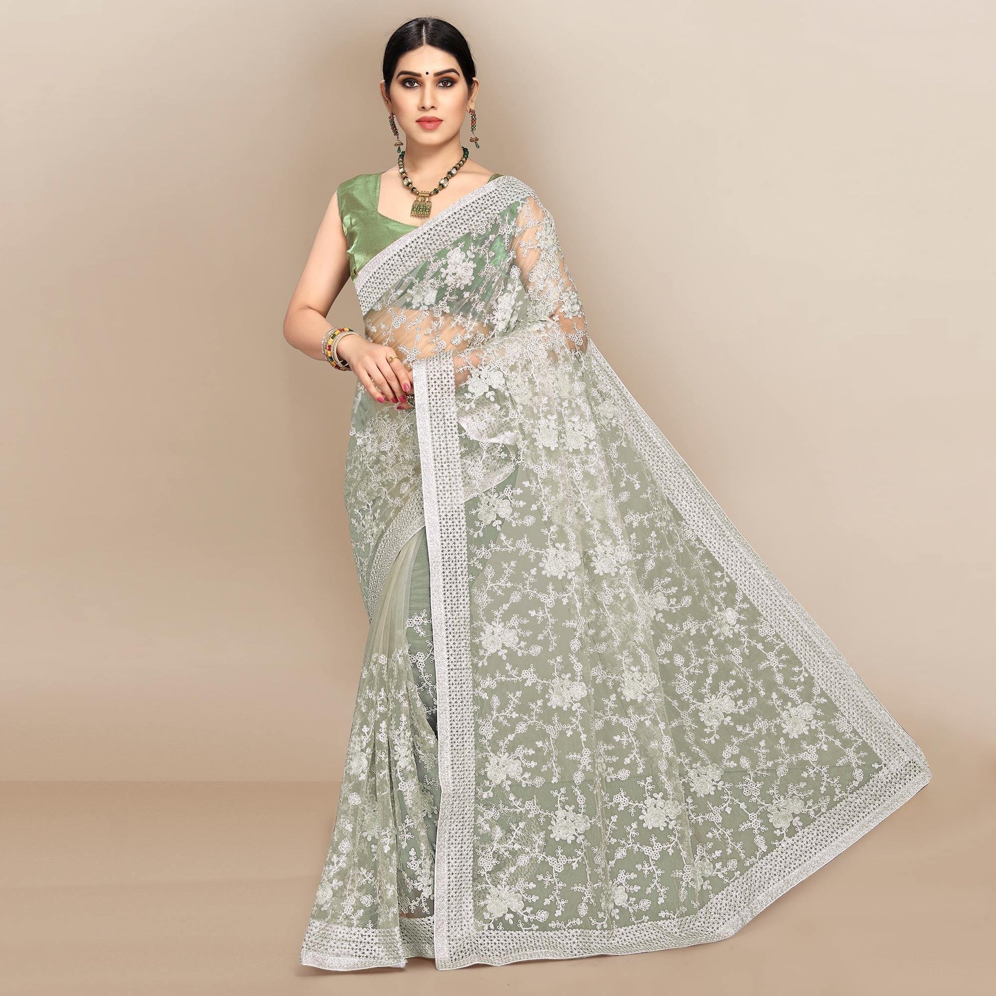 green-partywear-floral-embroidered-soft-net-saree-129763