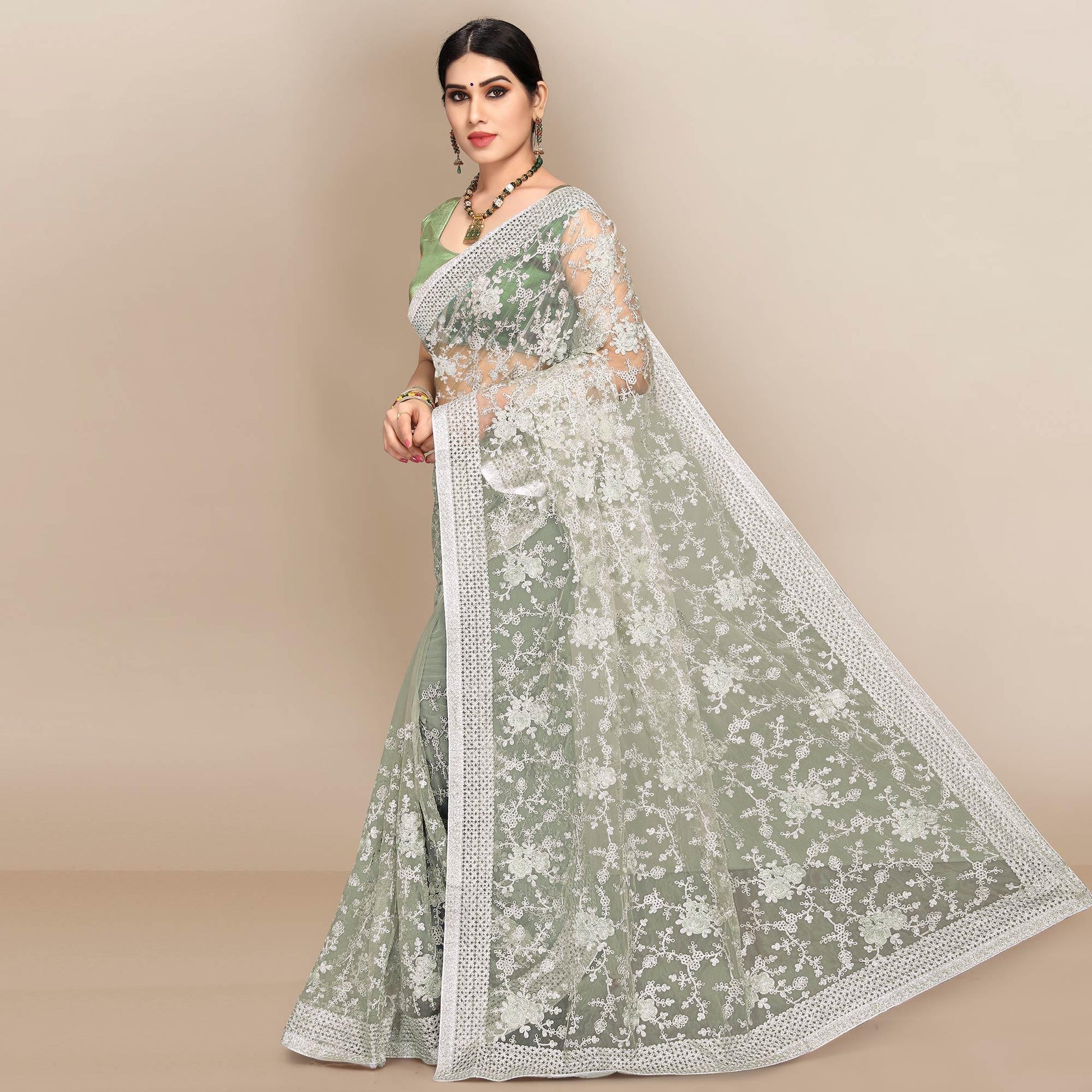 green-partywear-floral-embroidered-soft-net-saree-129763