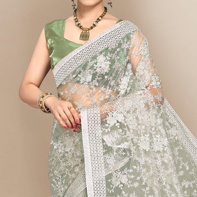 green-partywear-floral-embroidered-soft-net-saree-129763